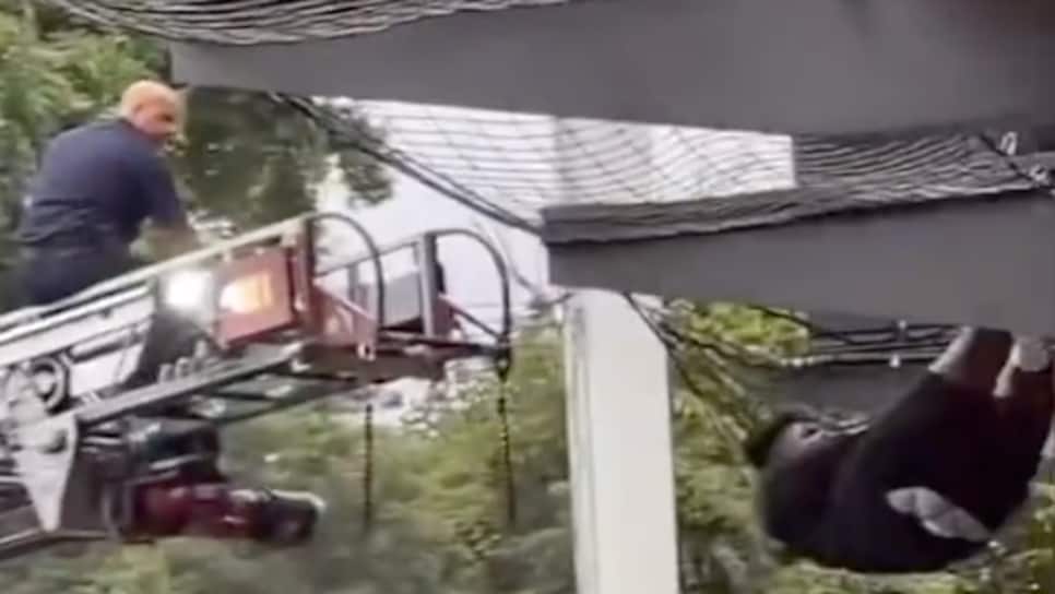 Golfer falls into Topgolf net, needs firemen to help him out Golf